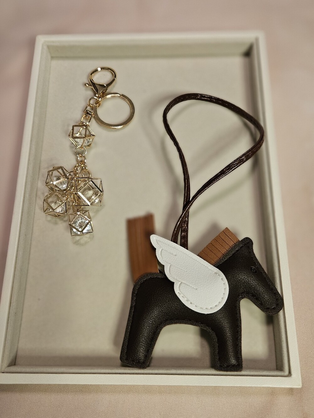 2 BAG CHARMS Brown and White Winged Horse  Bag Charm And Gold Geometric Charm